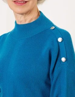 Pull chaud bleu boutons